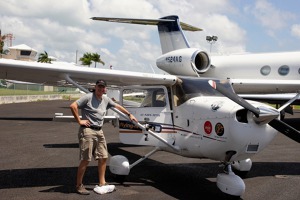 Peter Nikolaev with our Cessna at Grand Cayman Airport, George Town, Cayman Islands